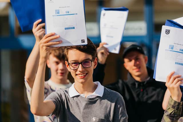 More students celebrating their impressive GCSE results, which highlight the successful work the Trust is doing