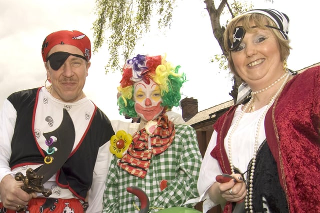 Paul, Rosina and Karen Clayton (left to right) as two pirates and a clown at Gawthorpe's 2009 Maypole Procession.