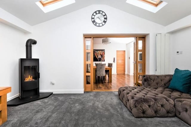 A superb reception space which forms part of this wonderful extension. Fitted with dual aspect uPVC double glazed windows with shutters, 2 Velux windows, under-floor heating and a vertical central heating radiator. The main focal point of the room is the corner gas stove set on to a granite style base.