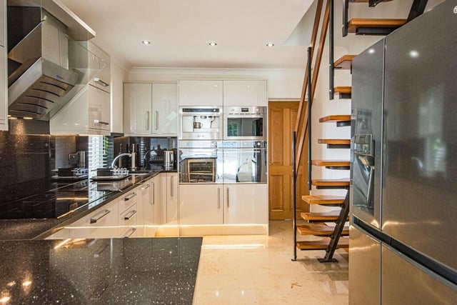 The high spec, bespoke open plan kitchen in the Gate House has Smeg appliances and granite worktops.