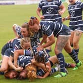 Featherstone Rovers Women celebrate after scoring a try against Salford. Photo by John Victor