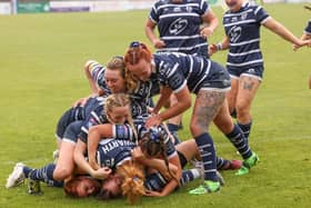 Featherstone Rovers Women celebrate after scoring a try against Salford. Photo by John Victor