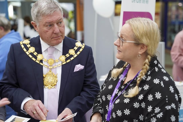 Mayor Coun David Jones and Sally Dickinson (Carers Wakefield & District) at the Silver Sunday event held at The Ridings centre in Wakefield.