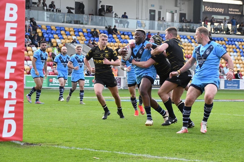 Gadwin Springer powers over for a try for Featherstone Rovers.