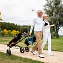 Walking and swimming or playing golf once or twice a week will help keep you fit and healthy. Photo: AdobeStock