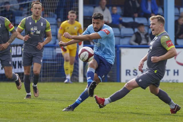 Nathan Curtis fires the ball forward for Ossett United in their last game of the season against Grantham Town. Picture: Scott Merrylees