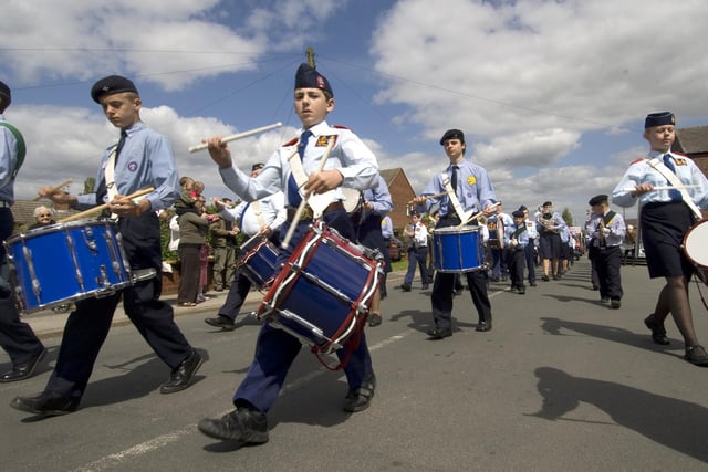 The marching brigade lead the event off down the streets of Gawthorpe during the 2009 Maypole Procession.
