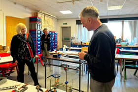 Volunteer Ian Guest shows the new Pumping interactve he has made to staff at the National Coal Mining Museum, Wakefield