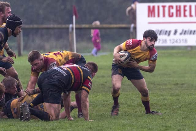 Sandal bring the ball away from a ruck. Picture: Scott Mererylees
