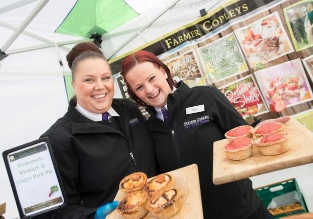 Jenny Painter & Mya Hayes with Farmer Copley's produce.