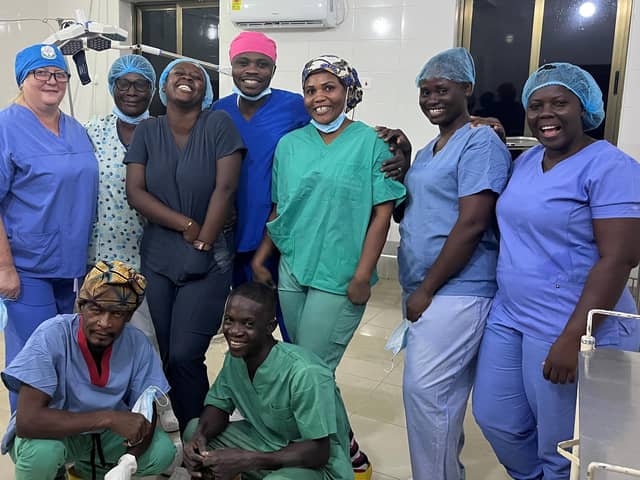 Melanie Precious (left), Mid Yorks theatre practitioner, with medics from Ghana.
