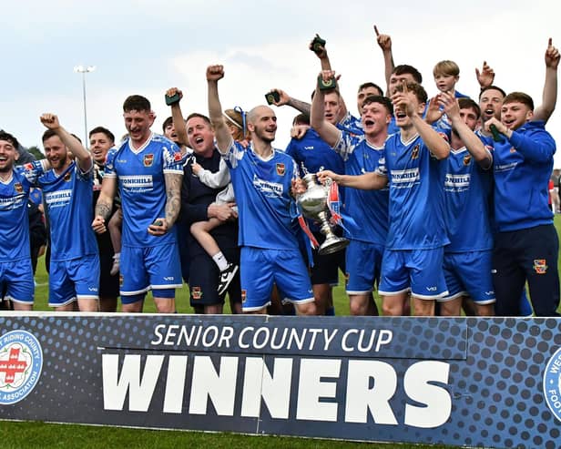 The Pontefract Collieries team celebrate winning the West Riding FA County Cup. Picture: Daniel Kerr