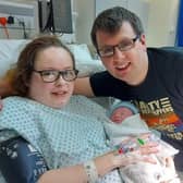 Hannah and Scott Lowrie with their new bundle of joy, Lewis, born on New Year's Day.