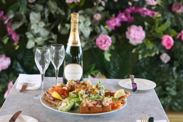 Pair a seafood platter with a bottle of Laurent-Perrier champagne