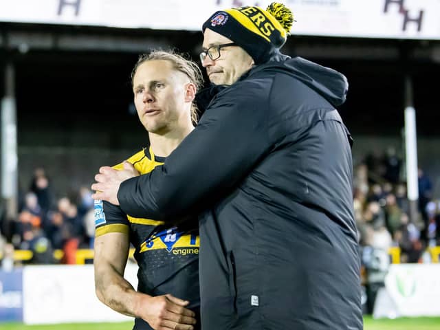 Castleford Tigers' Jacob Miller is consoled by head coach Craig Lingard. Picture by Allan McKenzie/SWpix.com