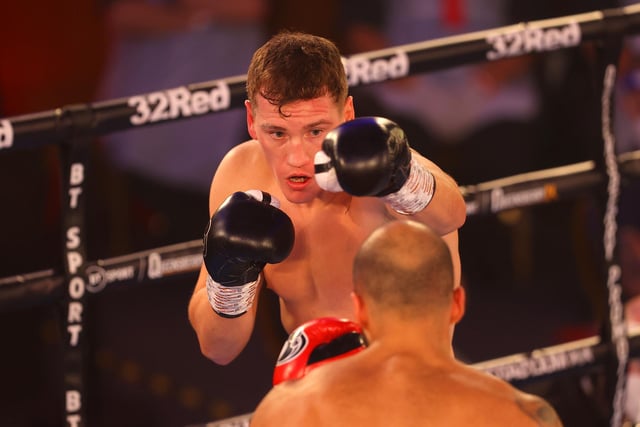 Jack Massey punches Mohammad Ali Bayat Farid during the Cruiserweight fight between Jack Massey and Mohammad Ali Bayat Farid at The Church House on November 28, 2020 in London.