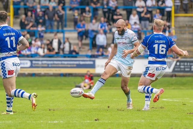 Johnathon Ford puts a kick in behind the Halifax defence. Picture: Dec Hayes