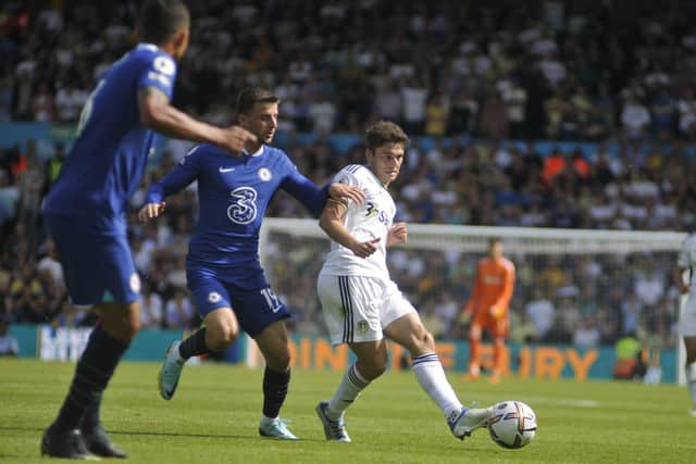 Leeds United's Dan James takes on the Chelsea defence.