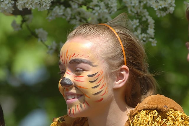 Lucy Woodall as the lion from the Wizard of Oz in the Gawthorpe Maypole Procession in 2007.