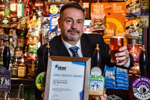 Shaun Slater from the The Black Rock pub, Wakefield recives a long service award.