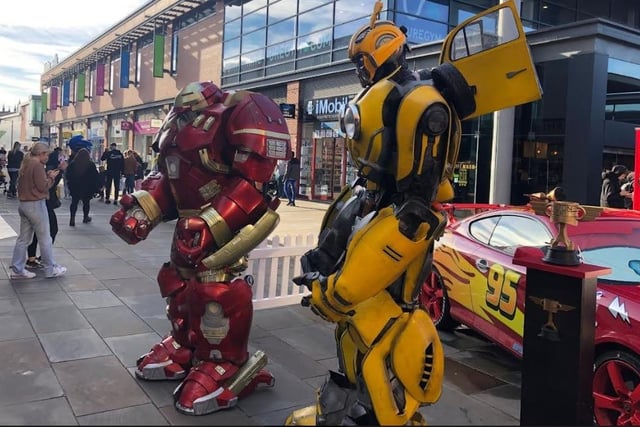 The impressive Hulkbuster posed for photos with Transformer favourite Bumblebee.