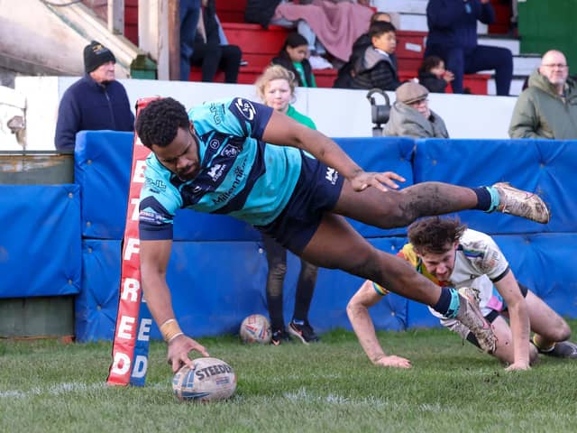 Manoa Wacokecoke comes up with a spectacular dive for a Featherstone Rovers try at Keighley Cougars. Picture: John Victor