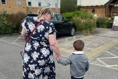 Lorraine walking grandosn Adrian to nursery school