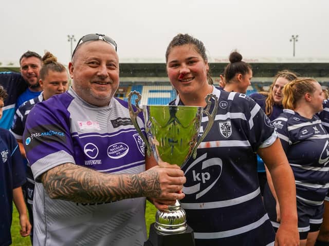 Featherstone Rovers Women captain Brogan Churm receives the Natalie Horrowell Cup. (Photo by JLH Photography)
