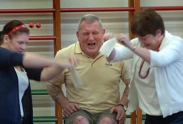 Hendal Primary School Premises Manager Eddy Roche has his legs waxed by Rachel Clawson and Headteacher Christine Platts in 2011.