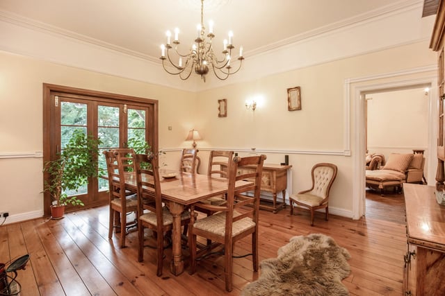 A dining area with plenty of natural light and access to the garden.
