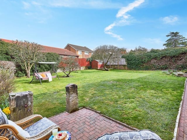 Beyond the barn conversation is a private rear garden with a secure boundary, plus an additional secluded side garden set around a mature magnolia tree.