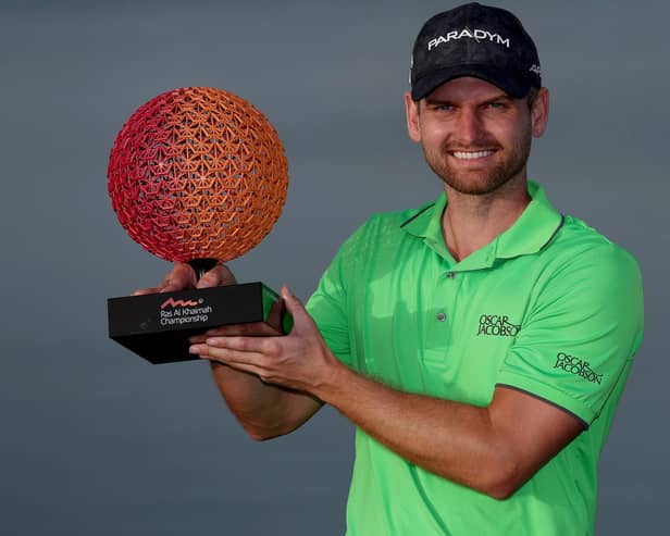 Daniel Gavins with the Ras Al Khaimah Championship trophy after his second DP Tour victory at Al Hamra Golf Club. Picture: Warren Little/Getty Images