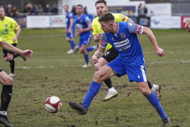 Jack Lumsden plays the ball forward for Pontefract Collieries.