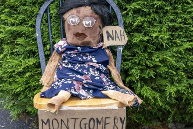 The scarecrows were scattered around the village.