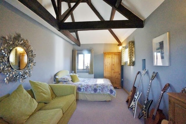 Another of the spacious bedrooms within the property.