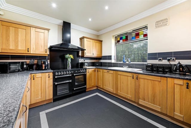 This spacious and inviting kitchen diner has a range cooker and beautiful engineered oak flooring.