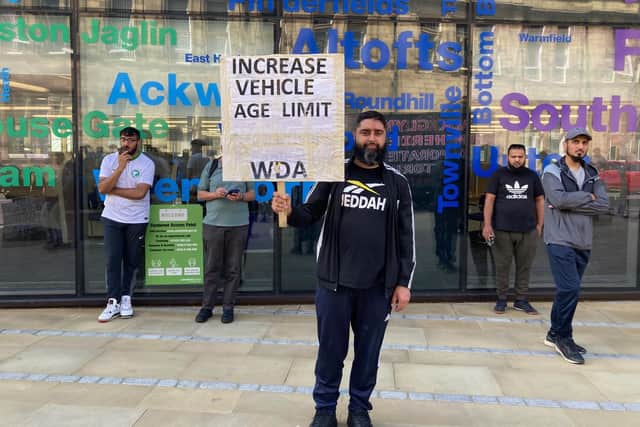 Taxi drivers staged an angry demonstration outside County Hall in Wakefield as they accused the local authority of putting livelihoods at risk.