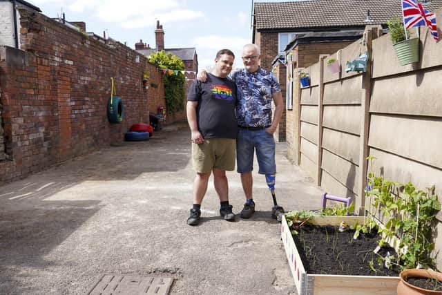 Residents of Soho Grove Edward and Jack Turton have turned an abandonded piece of land into a community garden. Picture Scott Merrylees