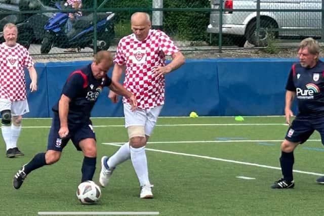 David Wandless in action for England over 60s in their walking football international against Croatia.