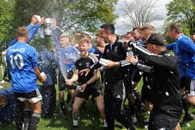 Chequerfield players celebrate after clinching the Wakefield Sunday League title. Picture: Angie Breen