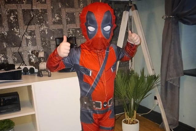 Katie Louise shared a photo of Lochlan-Hunter as a comic book Deadpool