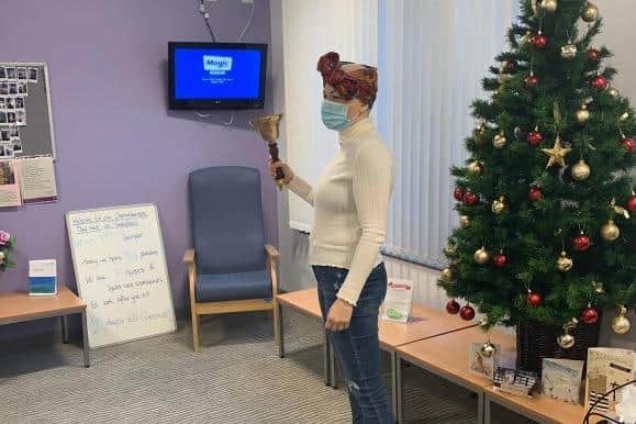 Jessica ringing the bell at the end of chemo in December 2020. She hopes she'll be ringing it again this summer.