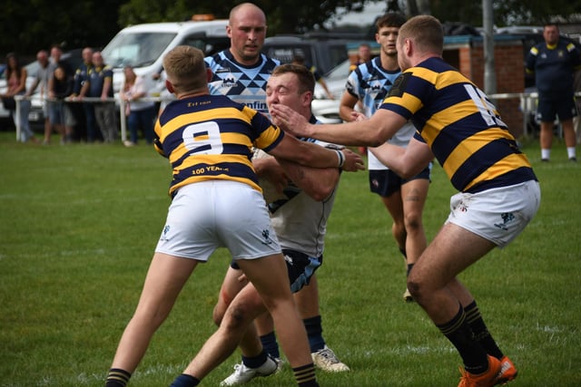 A Knights player braces himself for a crunching tackle. Picture: Rob Hare