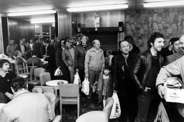October 29th 1984.

Striking miners queueing for food parcels at Sharlton Miners'  Welfare.