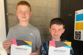 Jack Holmes and James Parfitt with certificates from the UKCC Megafinals in York.