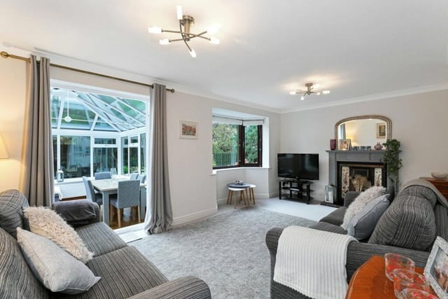 Both the living room and the conservatory look out over the attractive garden.