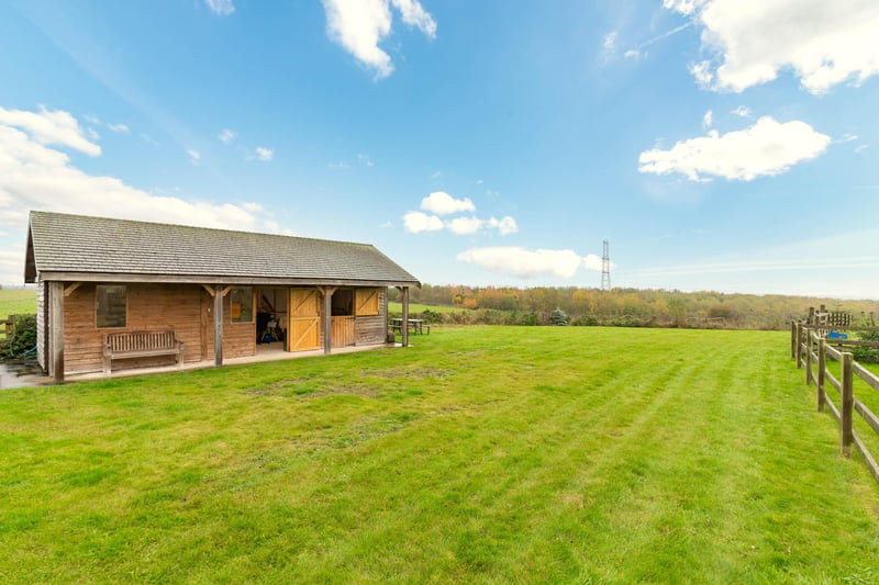 A stable block and a paddock form part of the property.