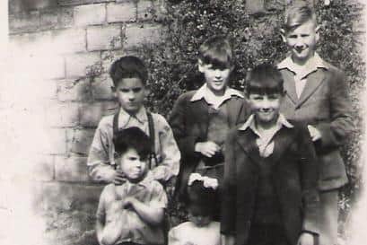 Bill with siblings in the 1940s