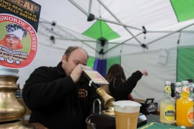 David Jones from Beer Huis pulling pints at the festival.