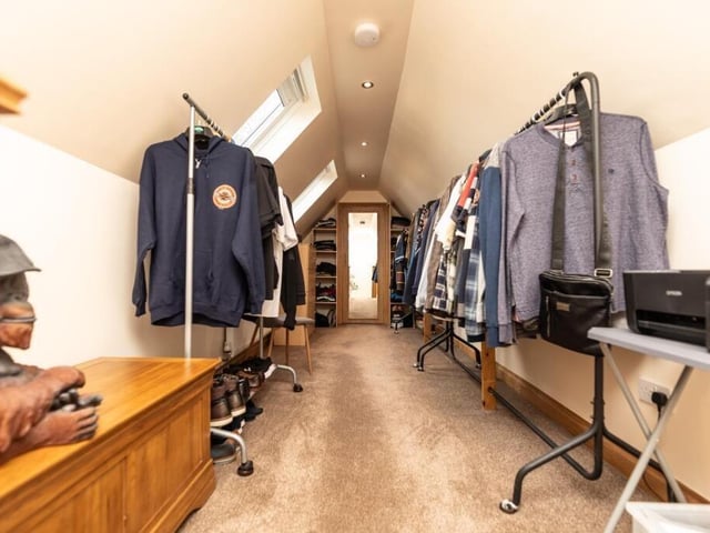 The dressing room to the main bedroom.
